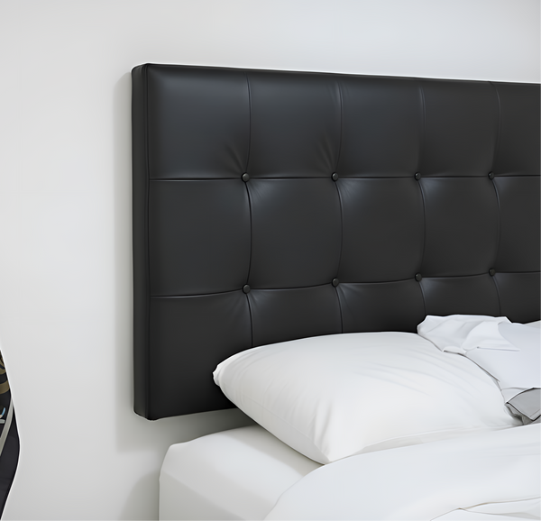 Detail of authentic black leather texture and handmade stitching from Morocco.